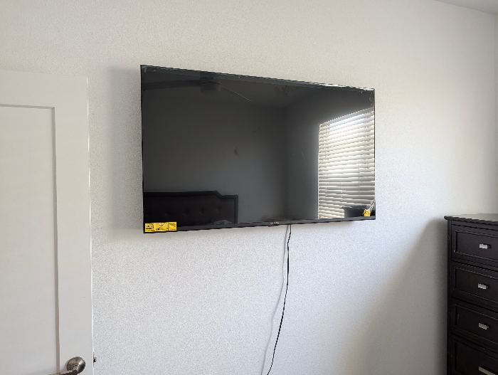 Wall-Mounted TCL TV