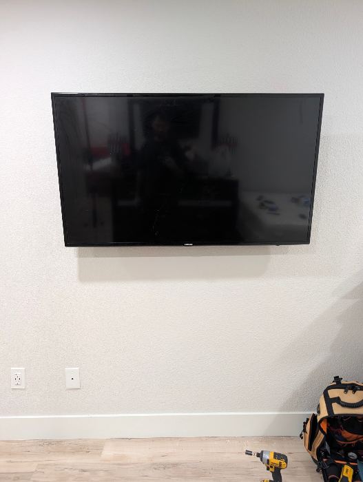 Wall-Mounted Flat Screen TV