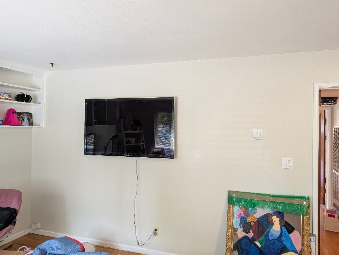 Wall-Mounted Flat Screen TV