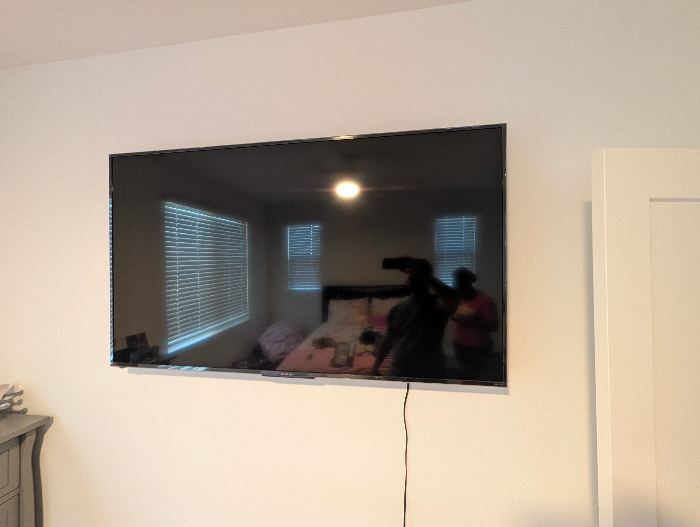 Wall-Mounted Flat-Screen TV