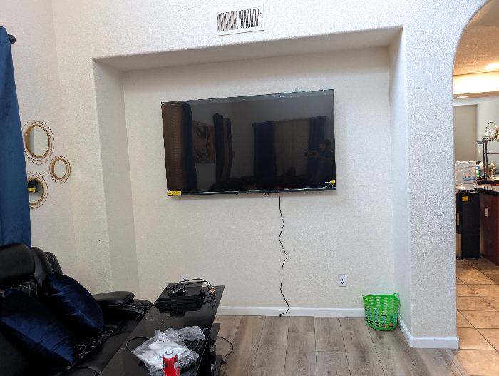 Wall-Mounted Flat Screen TV