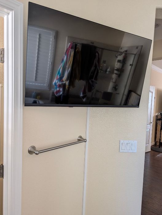 Wall-Mounted Flat-Screen TV